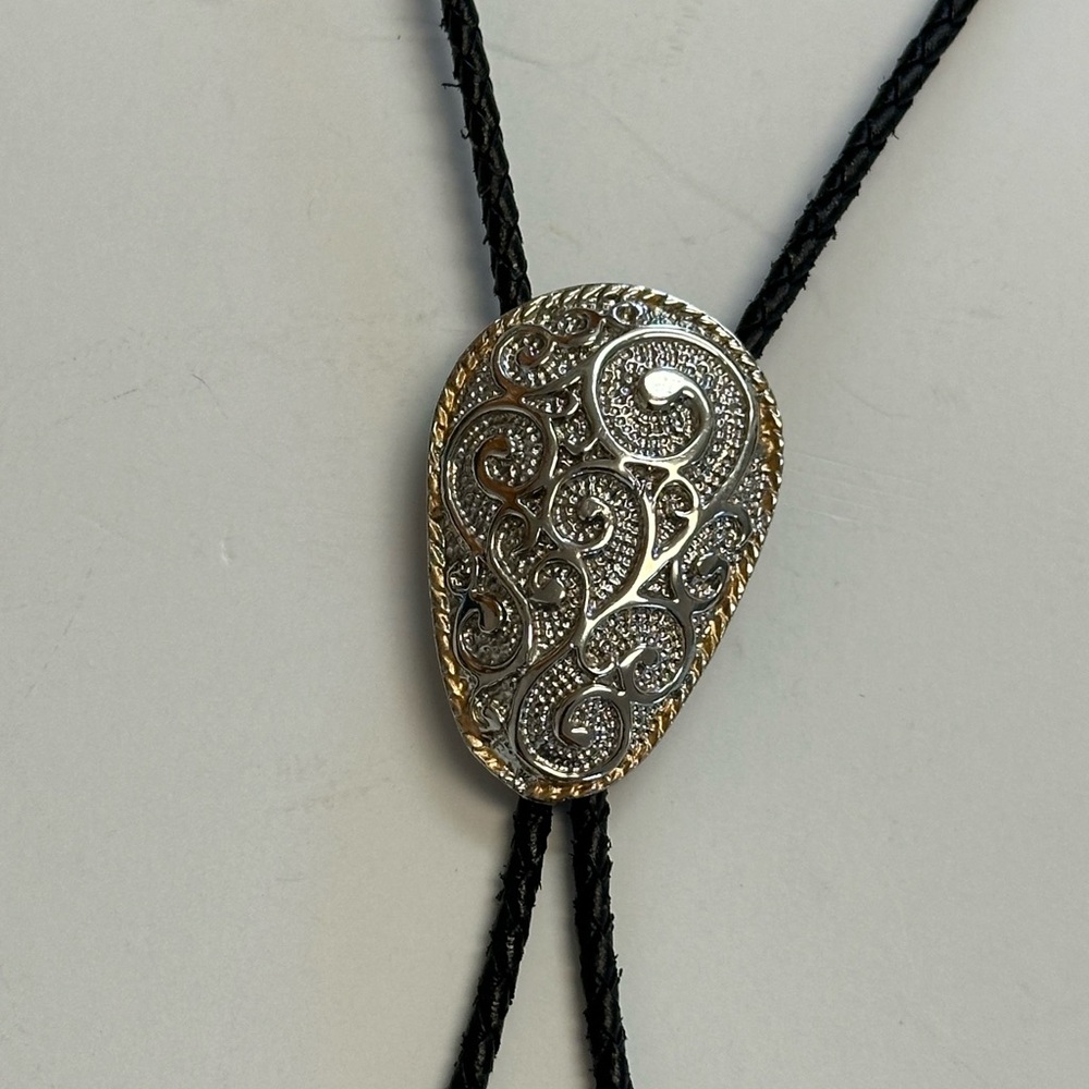 Silver Tone Western Style Bolo Tie with Gold Tone Twisted Rope Around Edge. - Picture 2 of 5